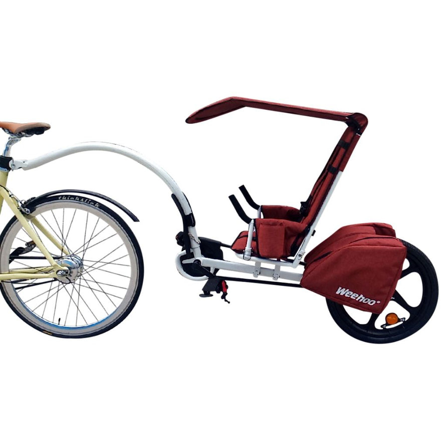 Remorque vélo enfant avec pédales et sacoches Thrill Weehoo